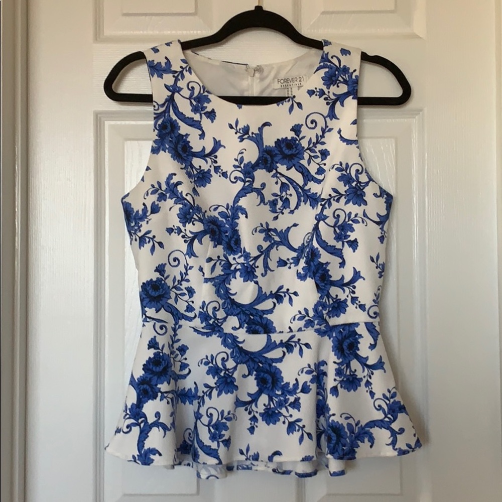 White and blue Peplum top.